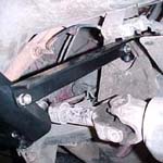 View of driver side strut rod.